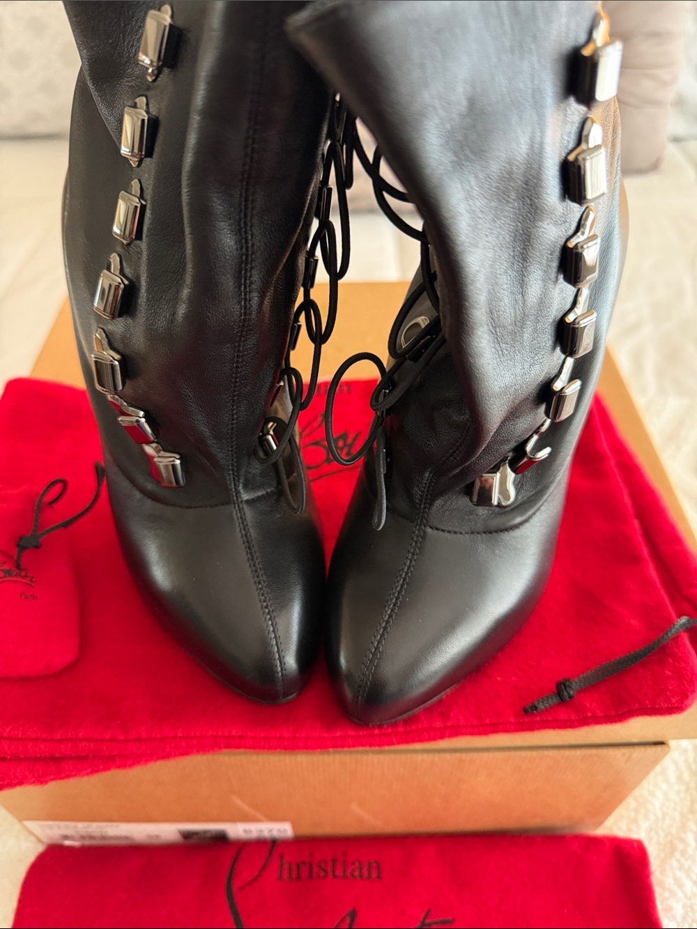 Christian Louboutin Black Leather Lace-Up Ankle Boots.  Excellent condition.
